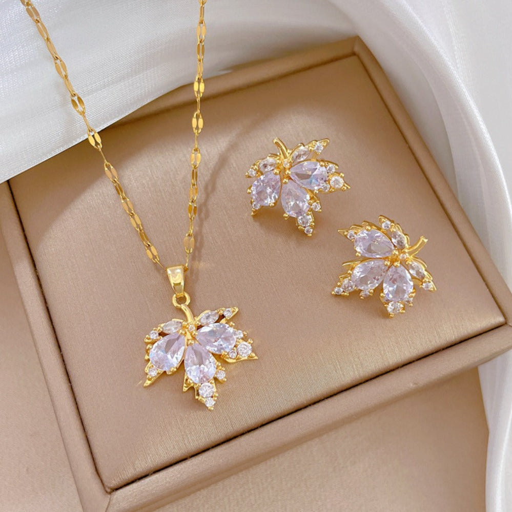 Pendientes de la suerte con hojas blancas y collar gratis